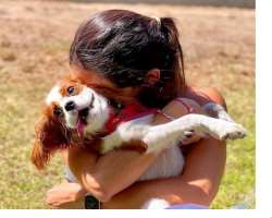 Her love for animals could be estimated with her photographs in which she is seen cuddling them and playing with them.